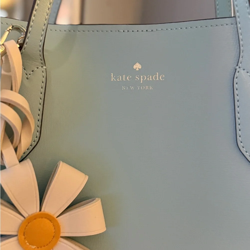Gorgeous like new med Kate Spade Harper leather tote bag with flower bag charm. - Picture 5 of 10
